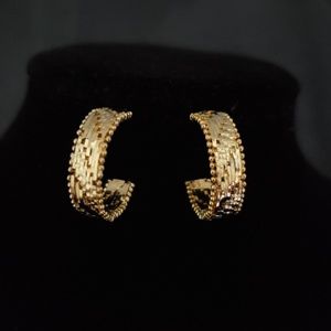 Gold vermeil Riccio 3/4 hoop earrings.